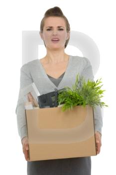 Fired woman employee holding box with personal items