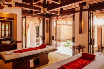 MAR 18, 2014 Krabi, THAILAND - Asian Thai tropical wellness Spa Concept, Spa room with massage beds, and Thai island tropical interior decorating