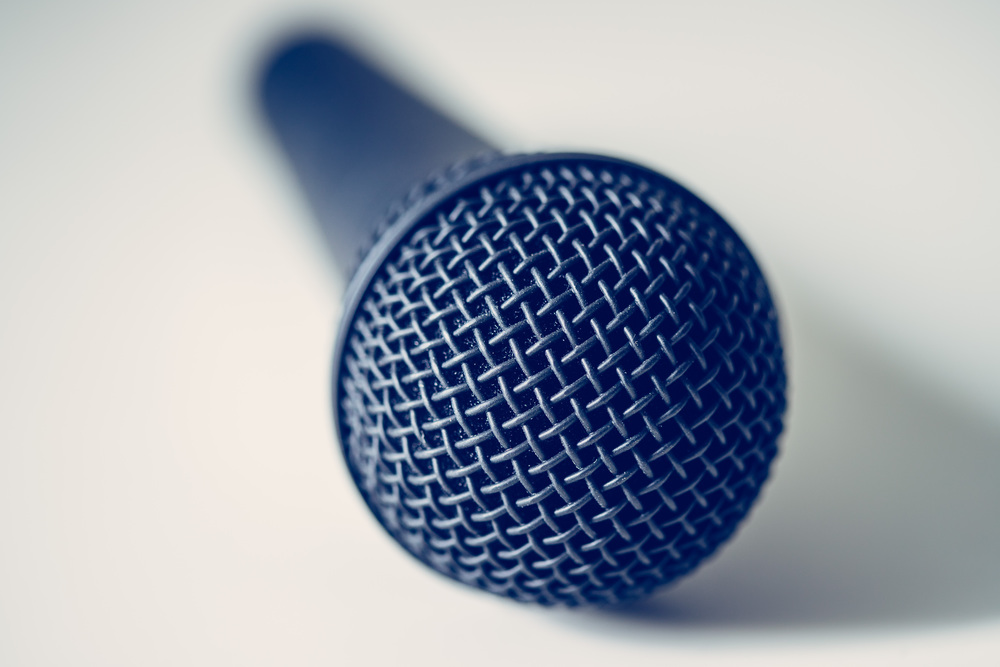 Close up picture of a black microphone