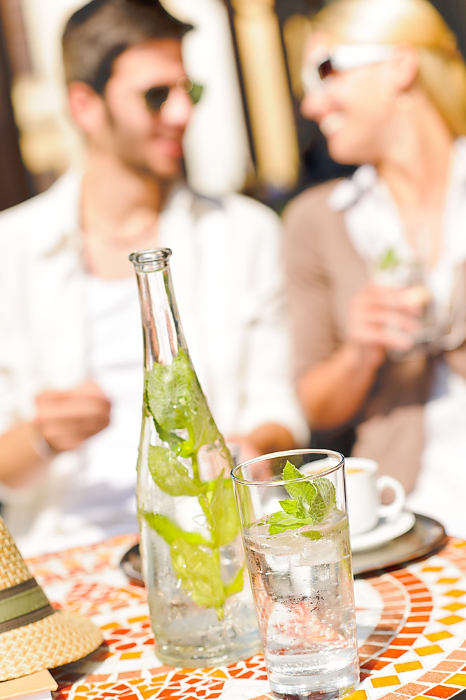 Close-up of terrace italian style refreshment table elegant romantic couple