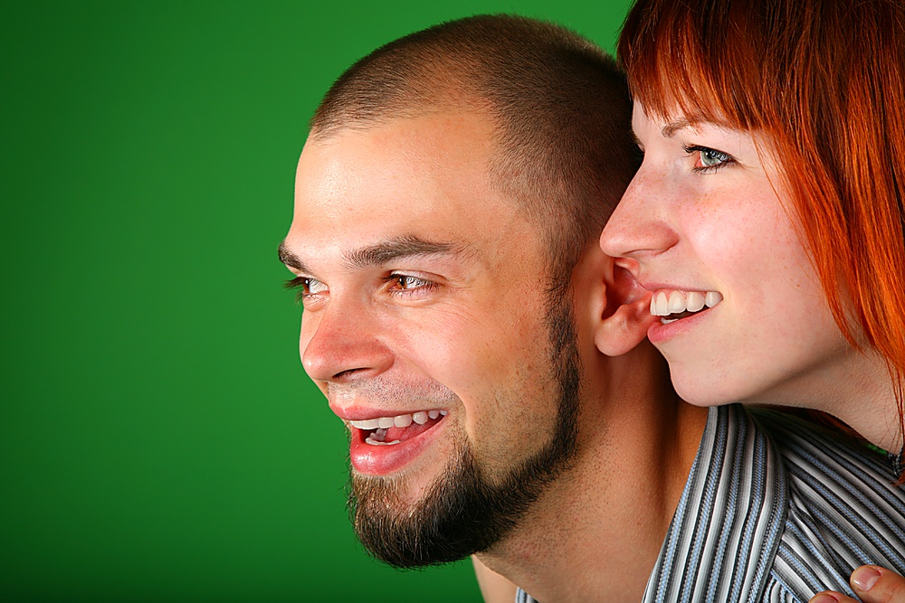 beard red couple smile faces on green