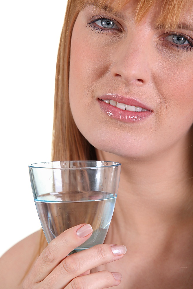 Woman with a glass of water