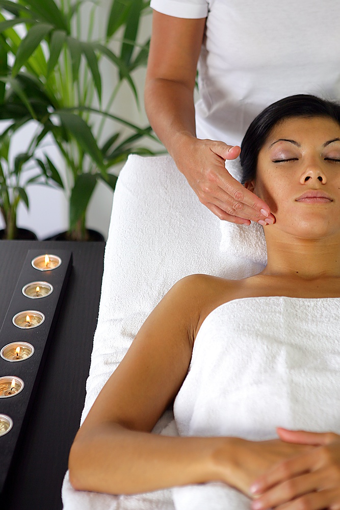 Woman having a face massage