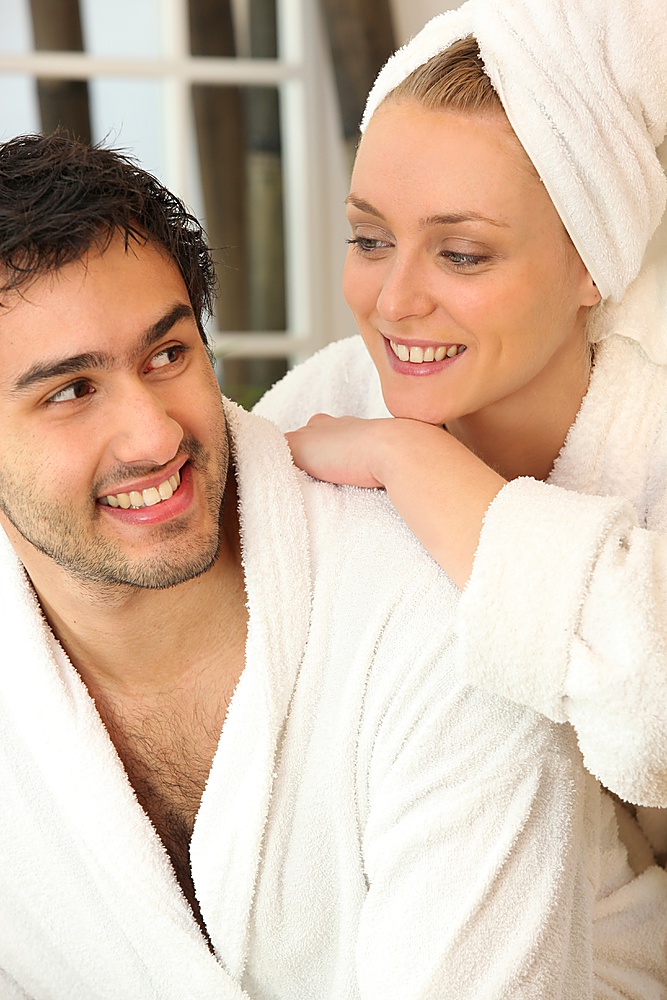 Couple relaxing together after a shower
