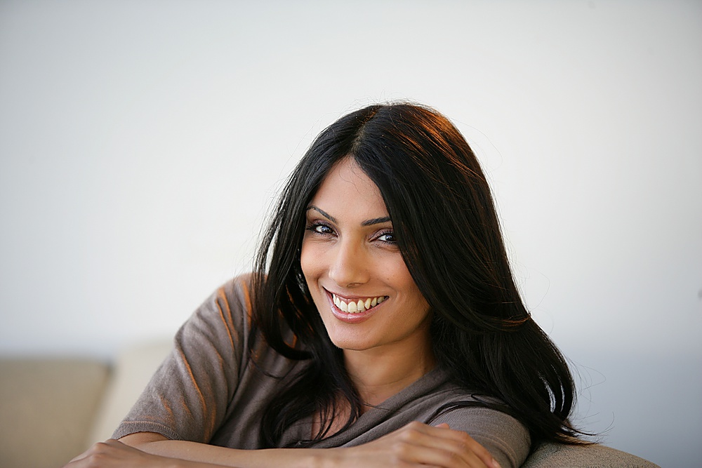 A smiling young woman