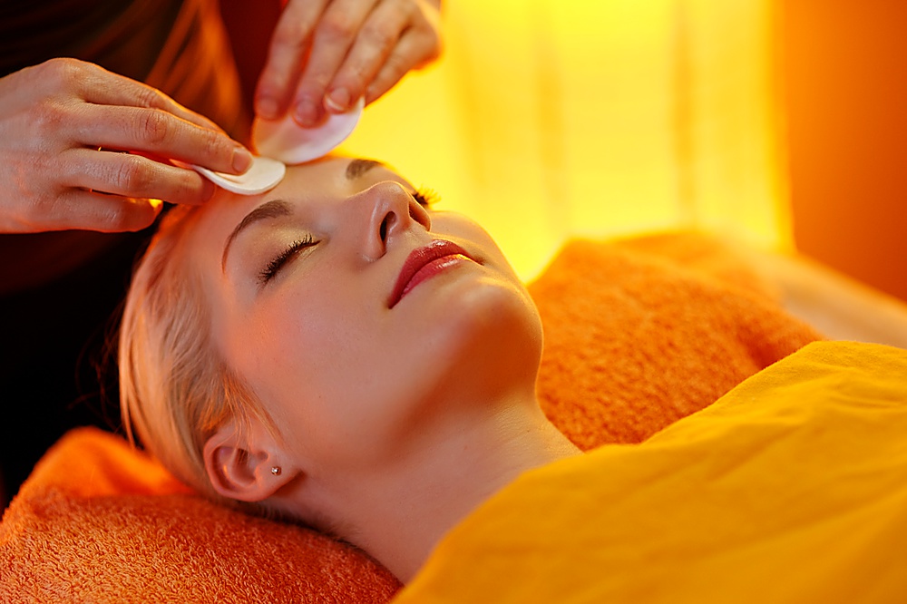 Beautiful woman having a face massage