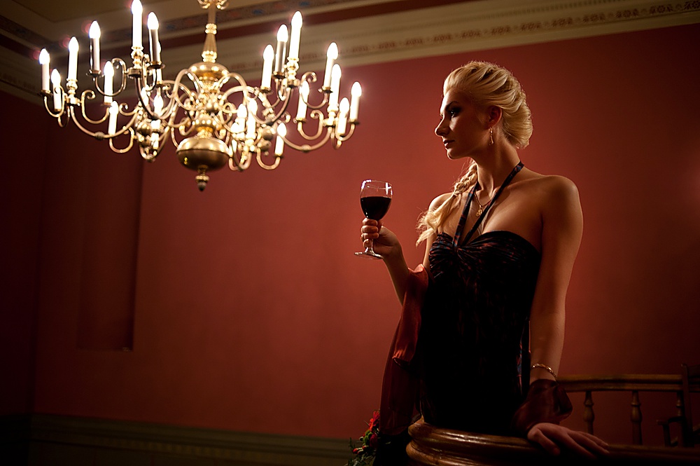 Beautiful lady with a glass of wine.