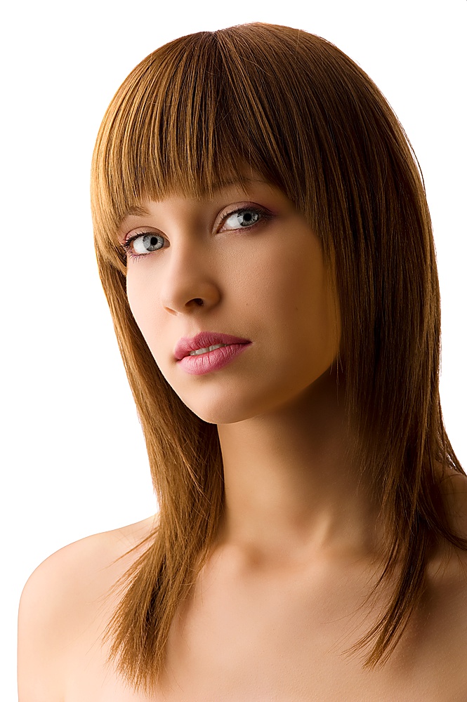 young beautiful female teenager with well brushed hair on white