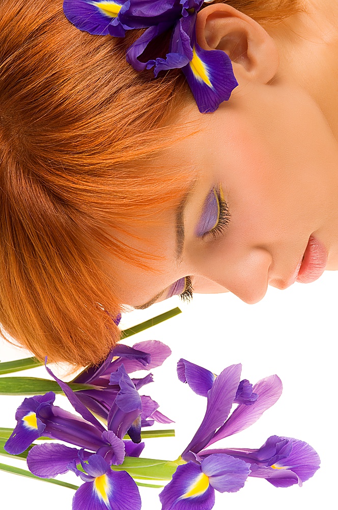sweet portrait of cute young model laying near flower with close eyes