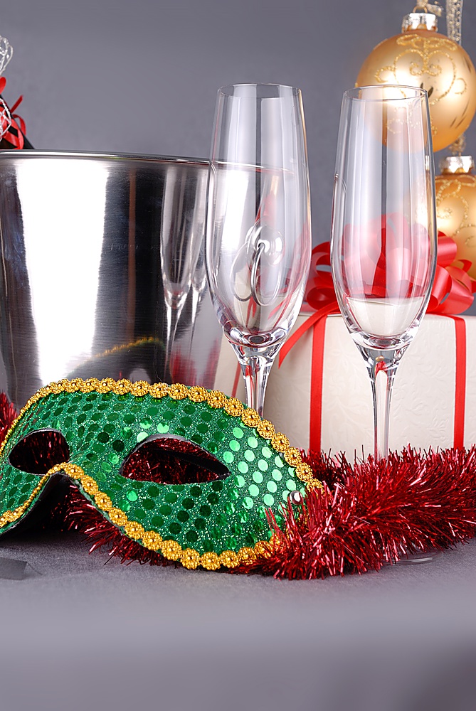 bucket with champagne bottle  and green mask. christmas symbols