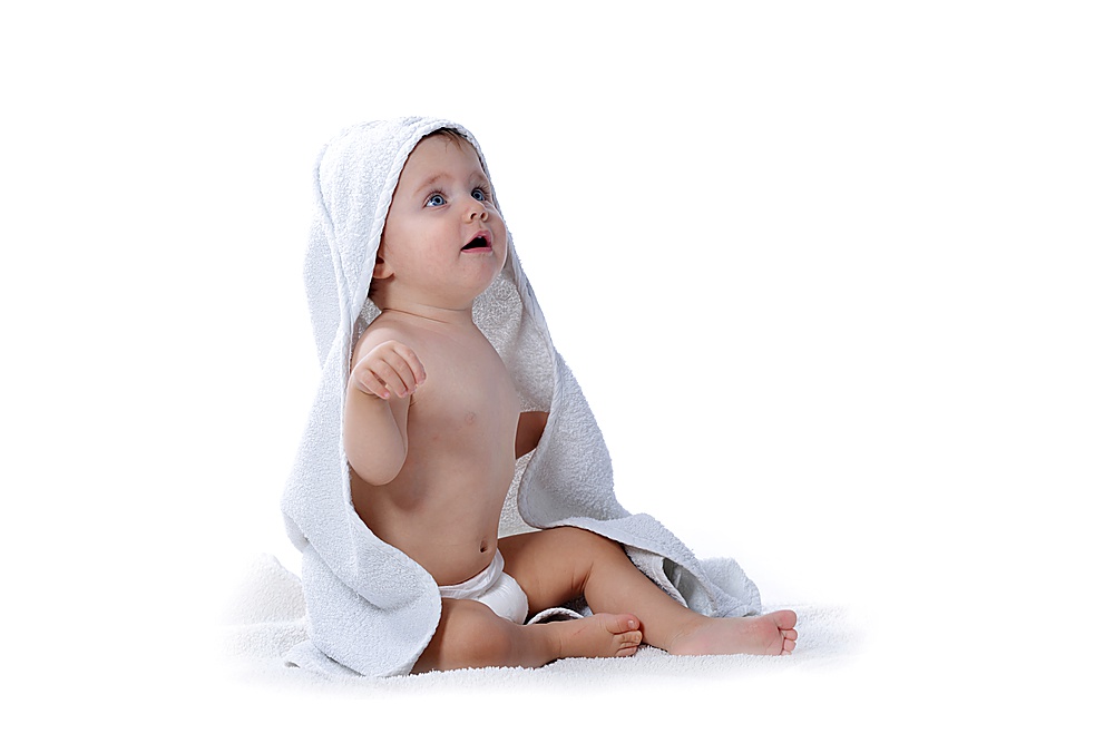 Cute baby girl with white towel isolated