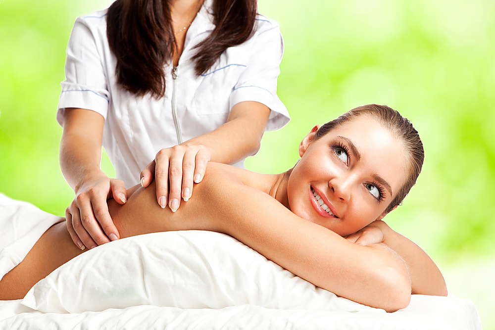 Beautiful woman at massage procedure