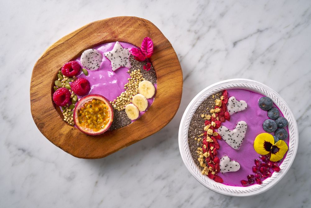 Acai bowls smoothie with passion fruit pitaya banana and berries