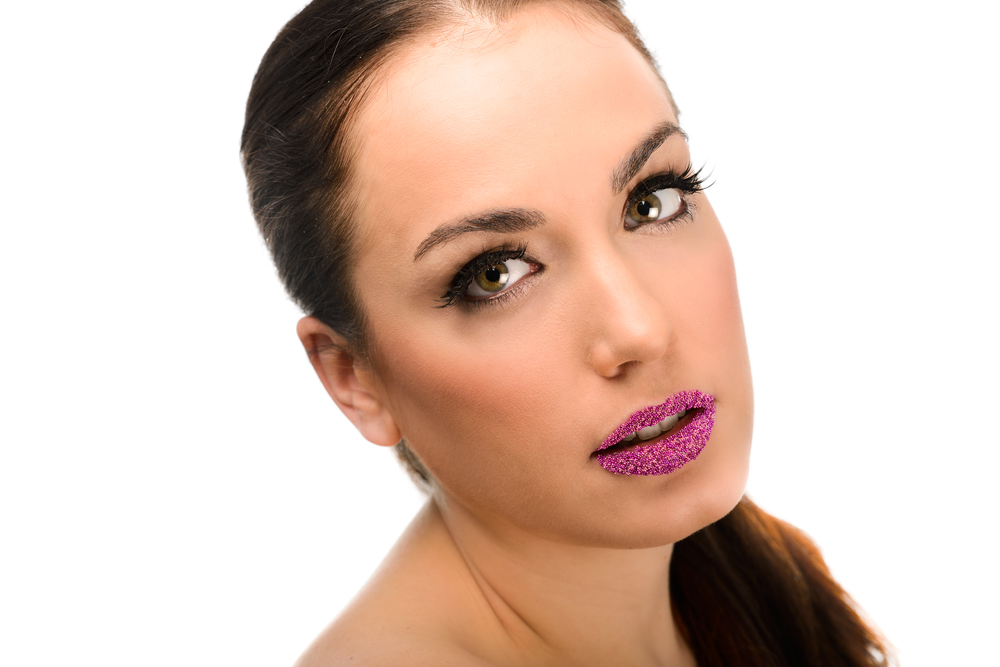 Portrait of attractive girl with fantasy lips. Make up. Perfect skin