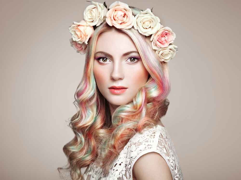 Beauty Fashion Model Girl with Colorful Dyed Hair. Girl with perfect Makeup and Hairstyle. Model with perfect Healthy Dyed Hair. Rainbow Hairstyles. Floral Wreath