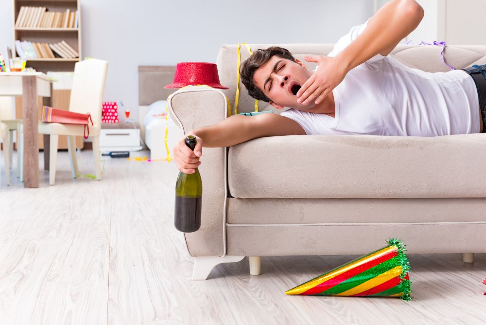 Man after heavy christmas partying at home