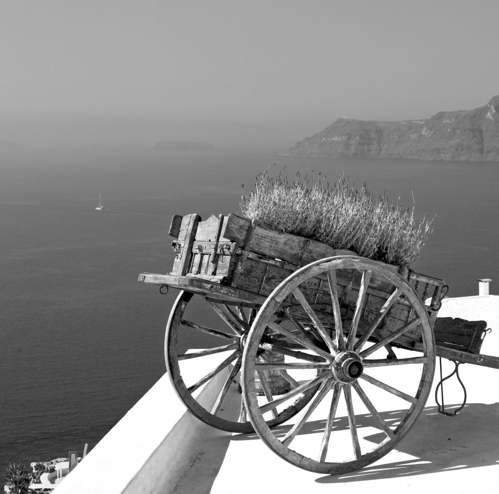 handcart   in    europe    vacation      cyclades santorini old town white and the sky