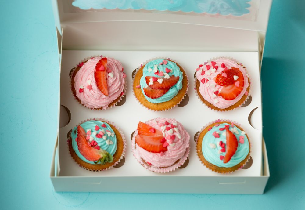 Closeup photo of colorful cupcakes with strawberry