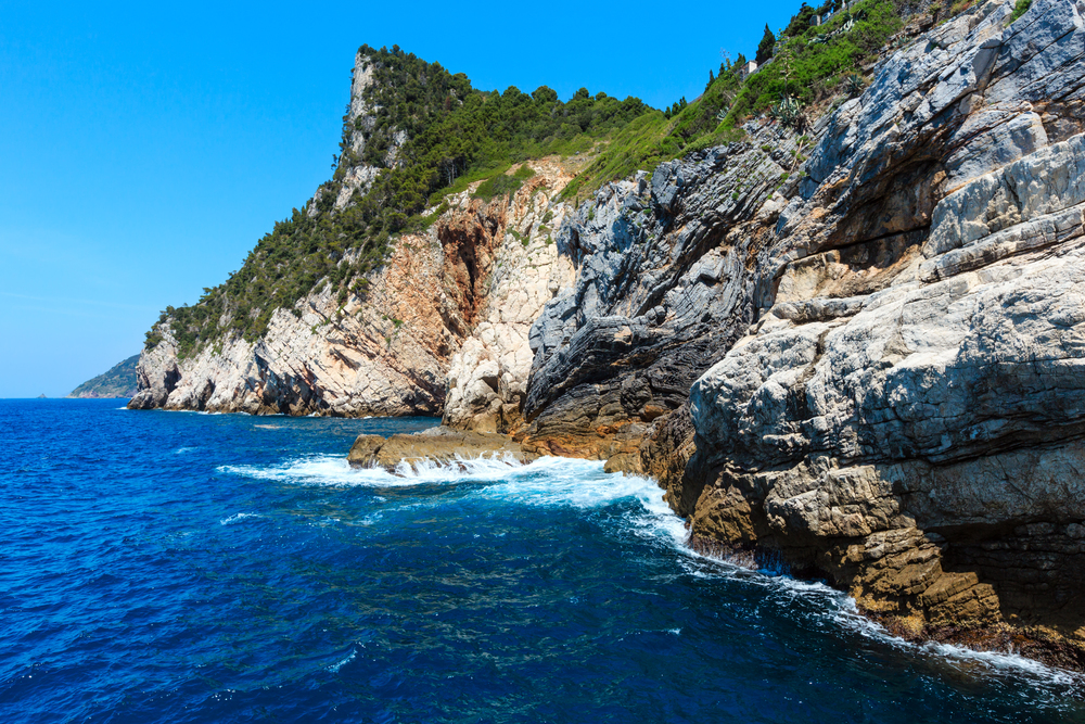 Beautiful rocky sea coast view from sea (Portovenere, near Cinque Terre, Liguria, Italy)