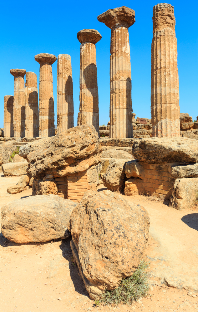 Temple of Heracles columns in famous ancient Valley of Temples, Agrigento, Sicily, Italy. UNESCO World Heritage Site.. Valley of Temples, Agrigento, Sicily, Italy