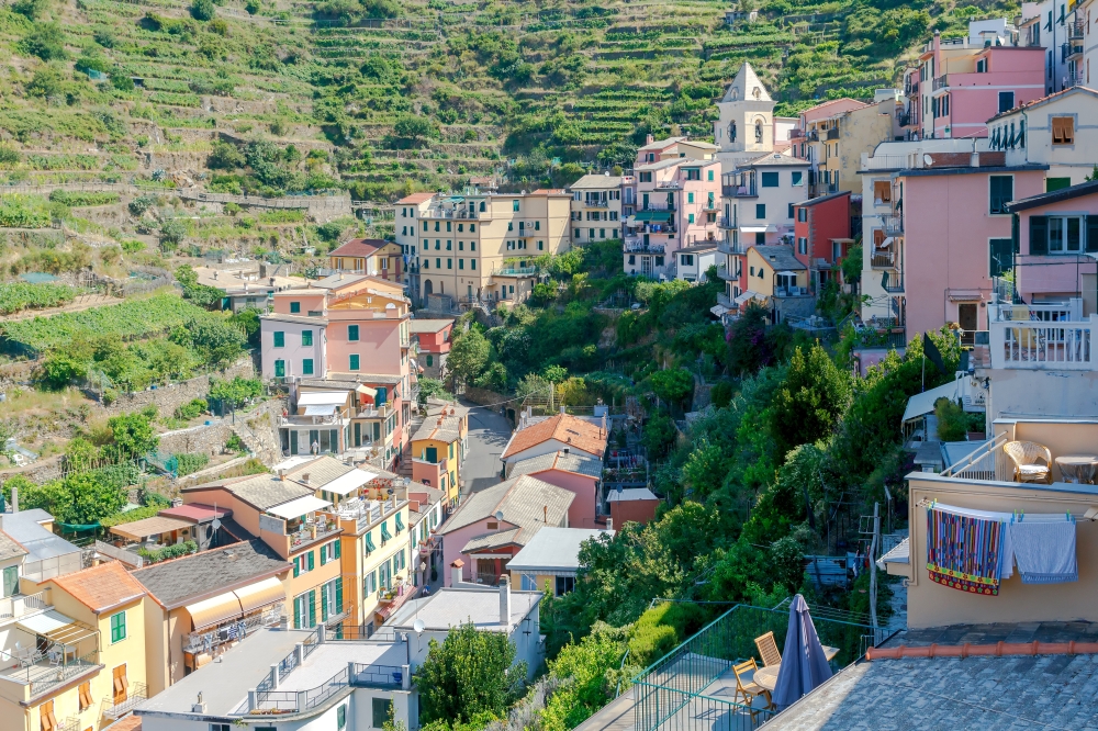 Colorful facades of old medieval Italian village Manarola. Cinque Terre National Park, Liguria, Italy.