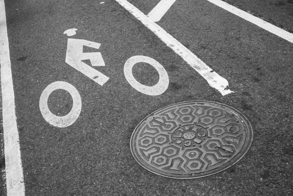 High angle view of bicycle lane symbol, New York City, New York State, USA