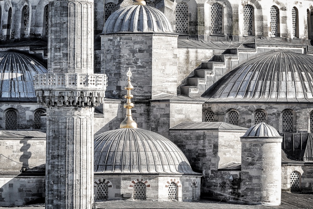 Closeup photo of a beautiful Blue Mosque background, details of an exterior of an ancient architectural masterpiece, black and white photo, Istanbul, Turkey