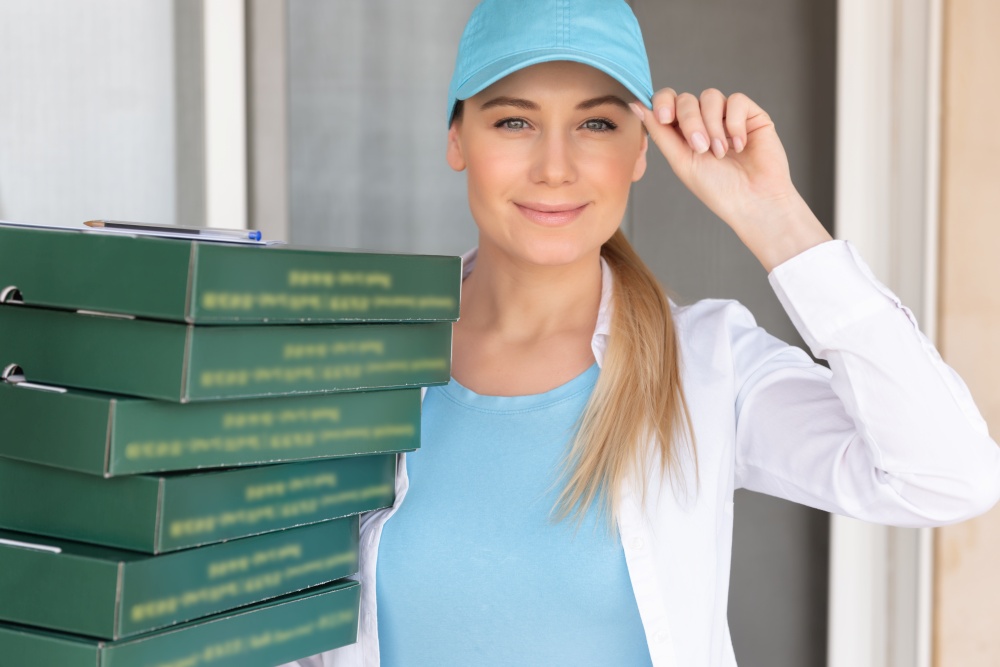 Portrait of a Nice Delivery Girl with Many Boxes. Service Occupation. Online Delivery. Food Delivery. Modern Way of Business.
