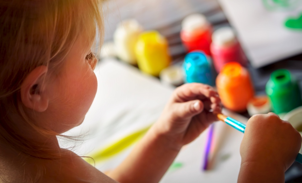 Cute Little Baby Having Fun at Home. Little Child Drawing With Colorful Paints in Daycare. Child&rsquo;s Creative Art And Activities. Happy Carefree Childhood.