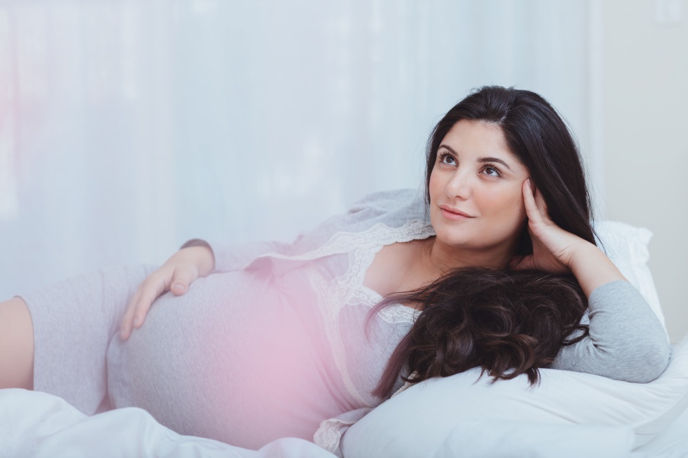 Dreamy Pregnant Woman with Pleasure Spending Time at Home. Happy Healthy Pregnancy. Family Love Concept.. Beautiful Pregnant Woman at Home