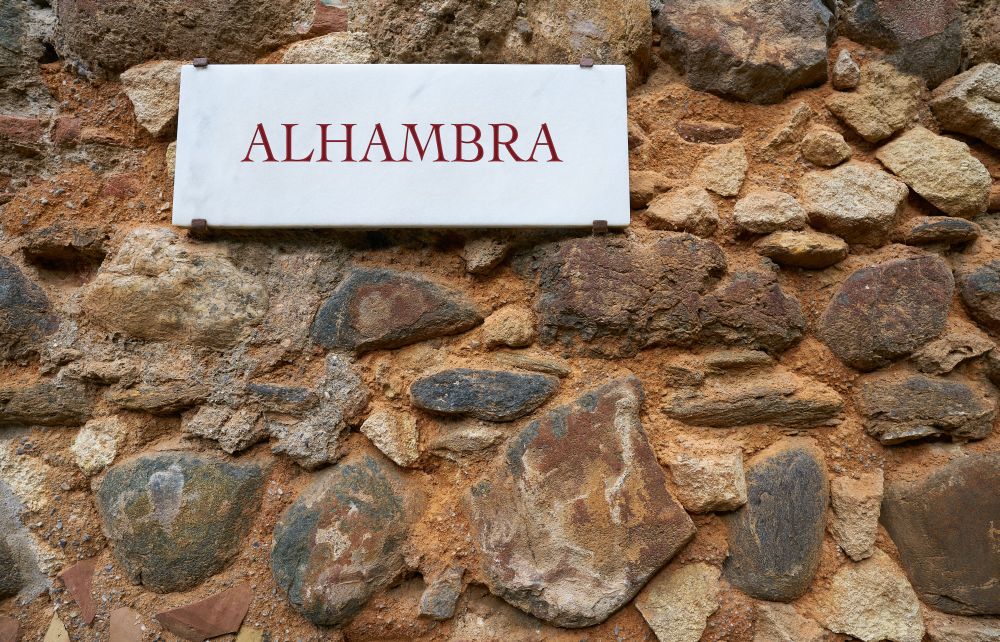 Alhambra main door marble sign digital improved letters in Granada Spain