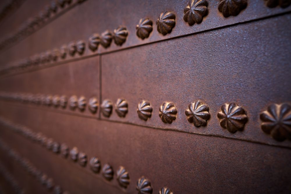 Alhambra Justice Door detail rusted iron nails in Granada of Spain