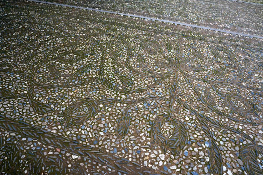 Stone mosaic floor in Alhambra of Granada at Andalusia Spain