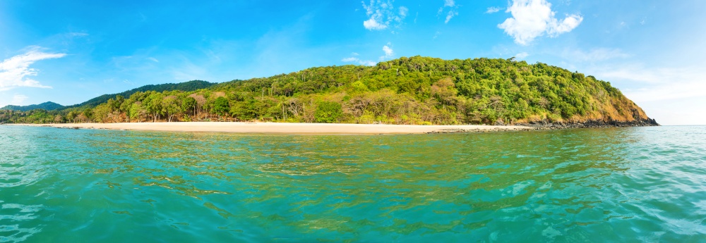Panorama of green tropical island with blue sea