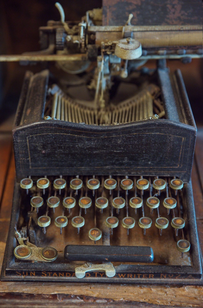 Closeup picture of a vintage, metal typewriter