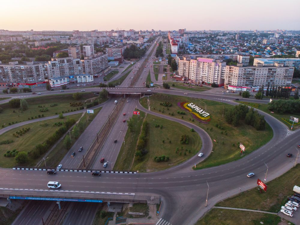 BARNAUL CITY. RUSSIA - JULY 28, 2019: Aerial shot of view to Barnaul city. Siberia, Russia. Summer sunny day on July 28, 2019 in Altayskiy krai, Siberia, Barnaul, Russia.. Aerial shot of view to Barnaul city.