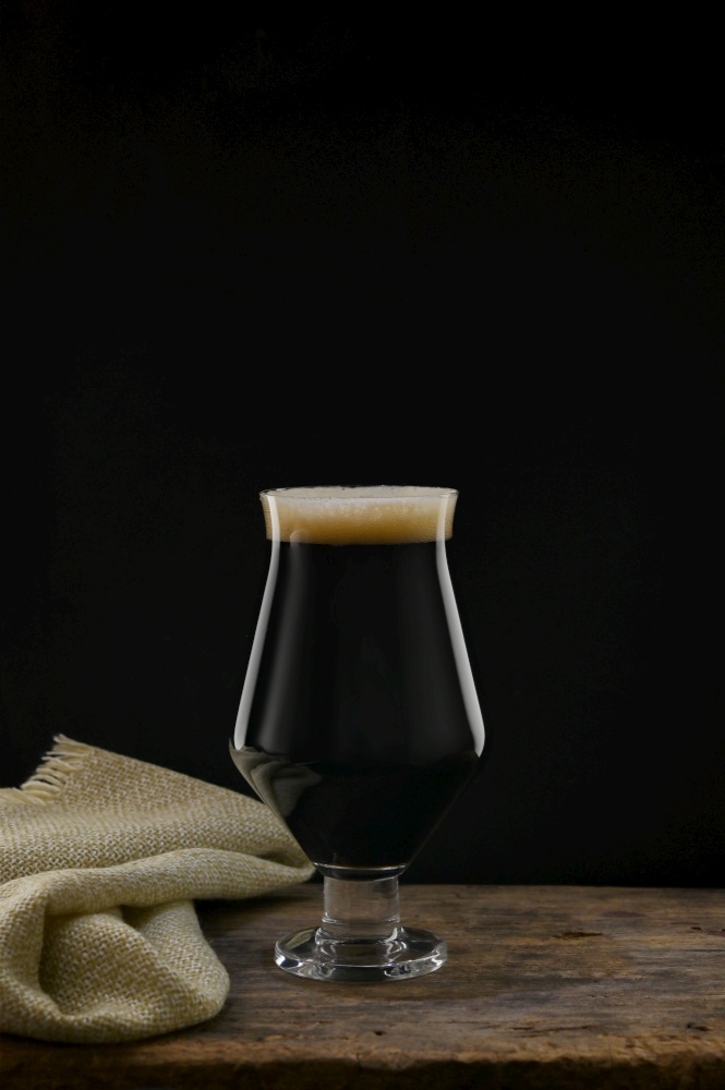 An Glass Of Craft Dark Stout Beer with Chocolate Flavor