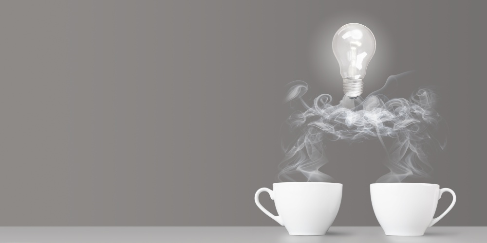 Idea birth. Business communication and creativity. Two coffee cups with bulb on cloud made of steam. Group training, brainstorming, business coaching. Idea birth from communication