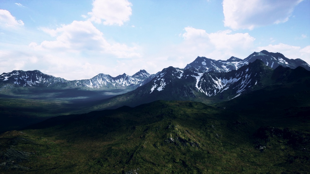mountains with snow capped peaks in summer