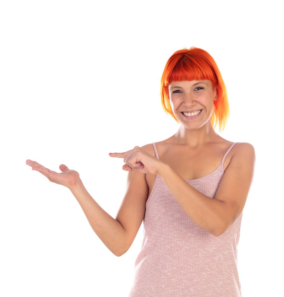 Woman showing something with her finger isolated on a white background