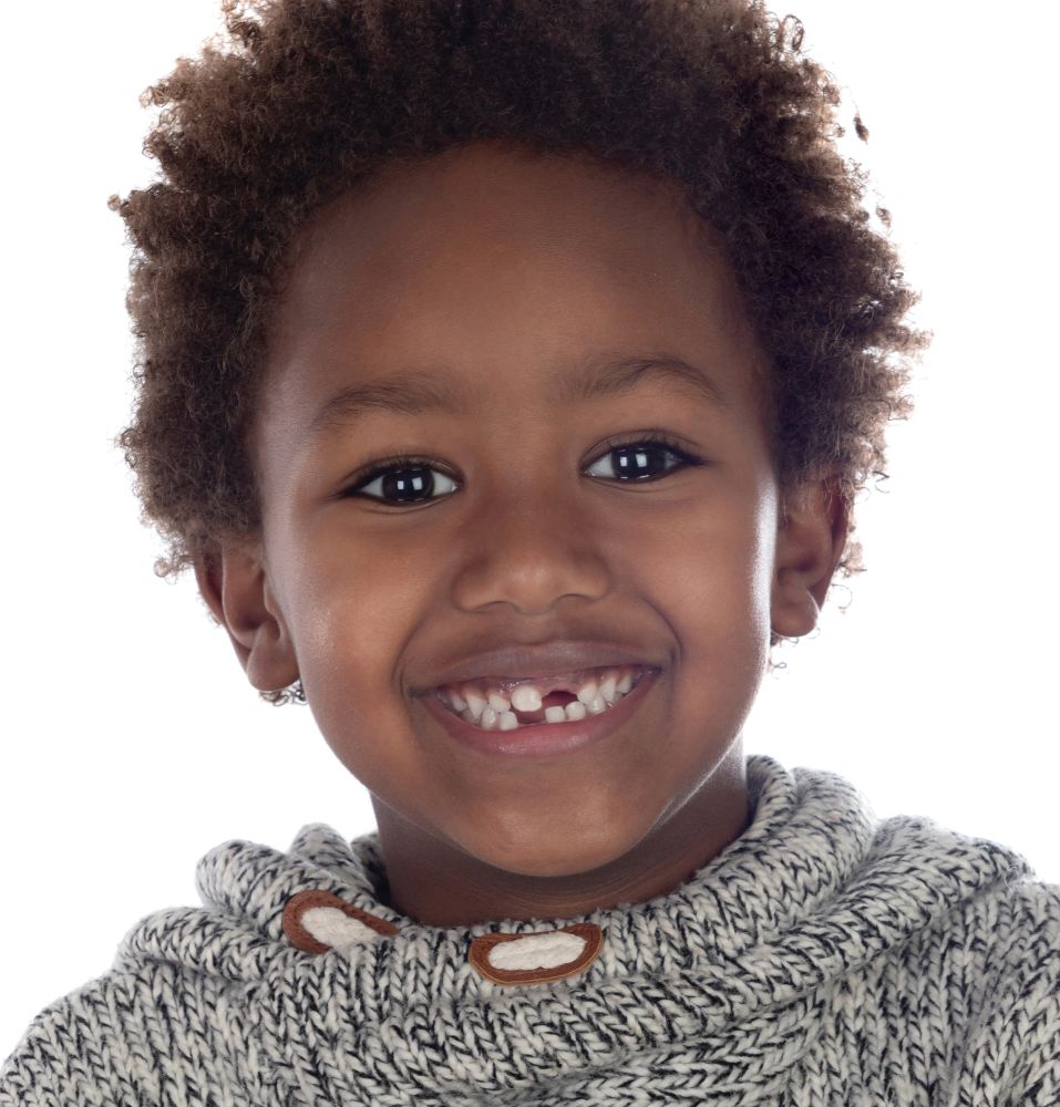 Beautiful Afro-American child without some teeth isolated on a white background