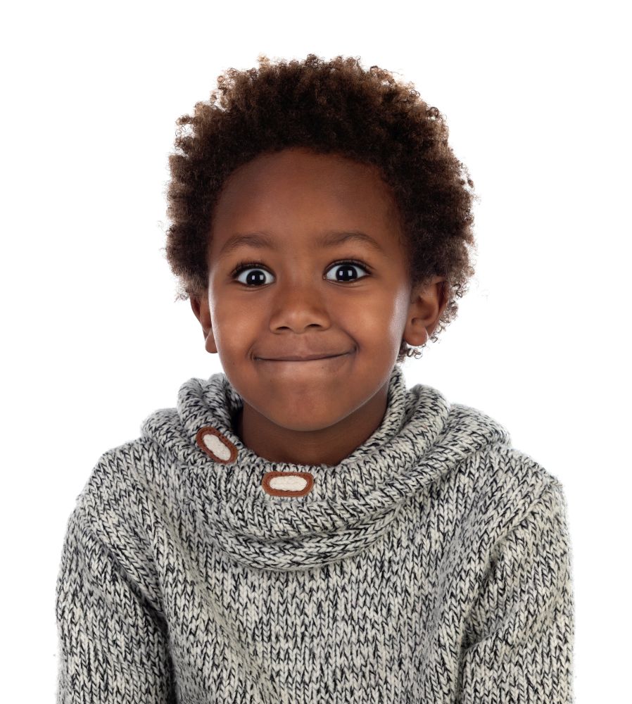 Funny expression of a small african child isolated on a white background