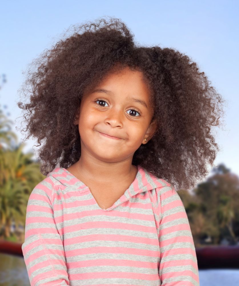 Happy African American girl with afro hair