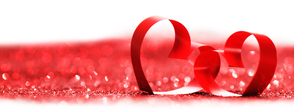 Red ribbon hearts on glitters isolated on white, Valentines day concept