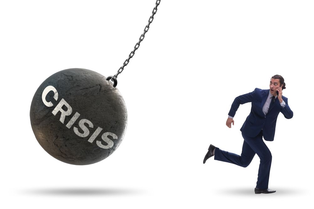 The businessman in crisis management concept. Businessman in crisis management concept