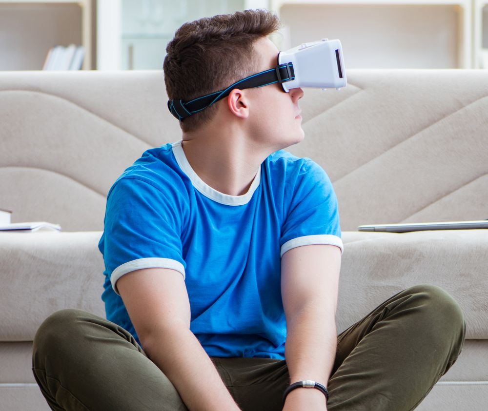 The young man with virtual glasses. Young man with virtual glasses
