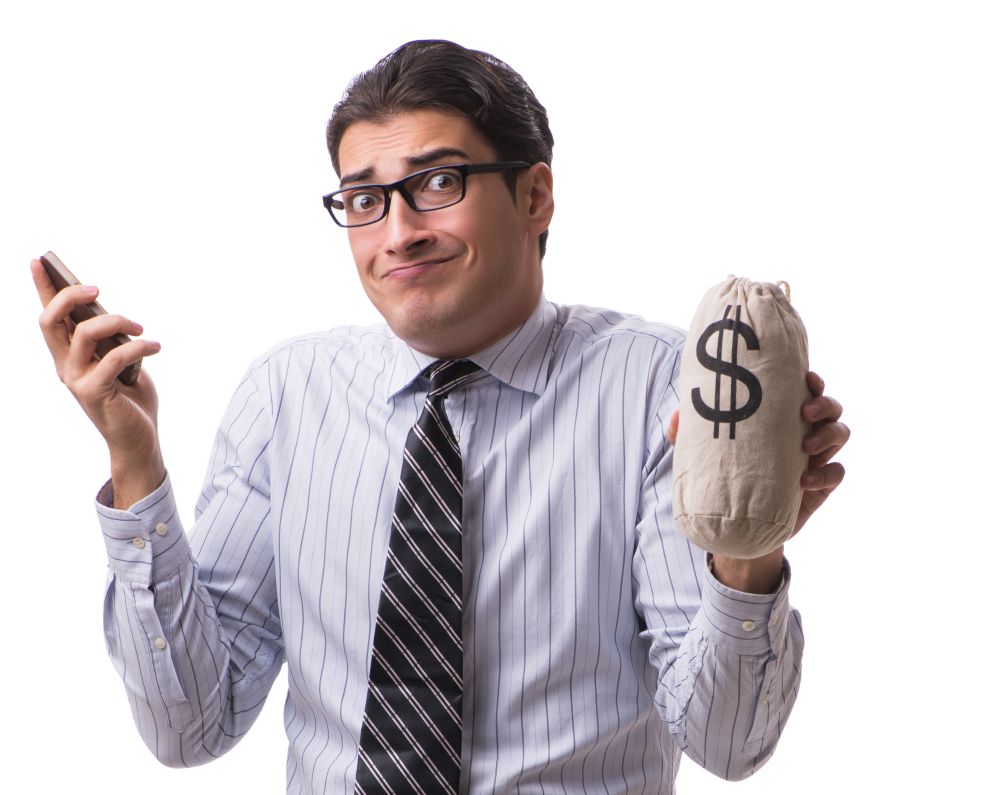The young businessman with money sack isolated on white background. Young businessman with money sack isolated on white background