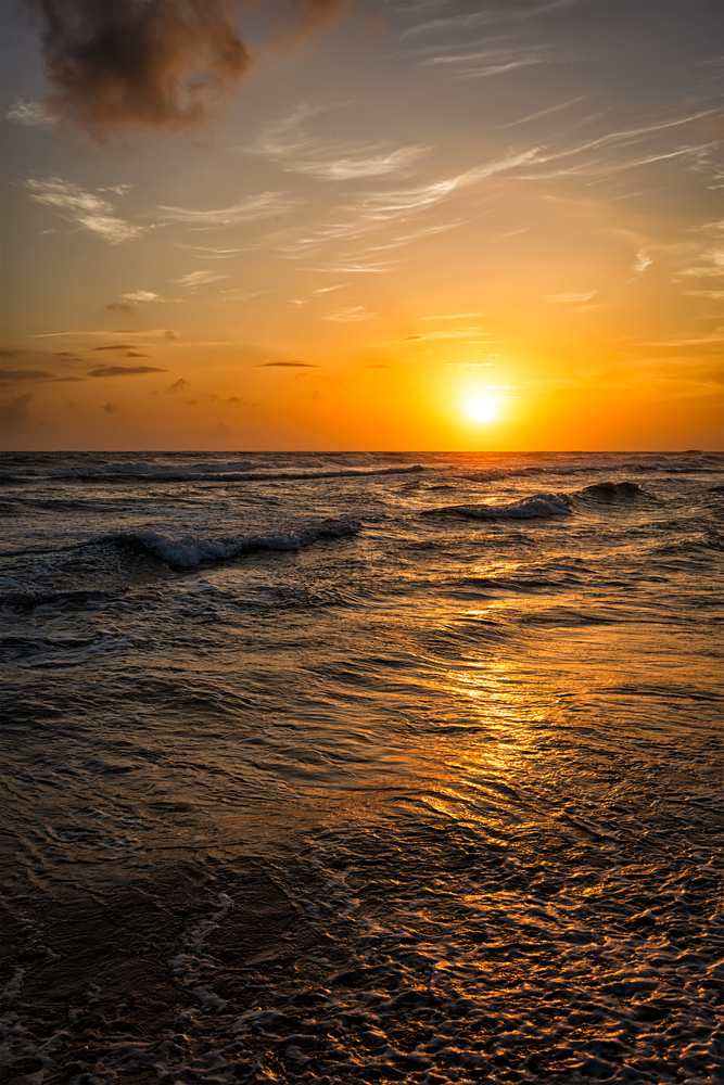 Ocean sunset in Hikkaduwa, Sri Lanka. Ocean sunset with waves