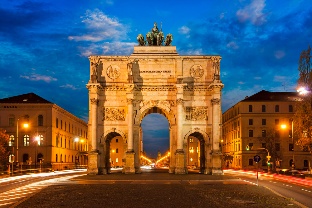 Siegestor (Victory Gate) in the evening. Motion blur of car lights because of long exposure. Munich, Bavaria, Germany. Victory Gate, Munich
