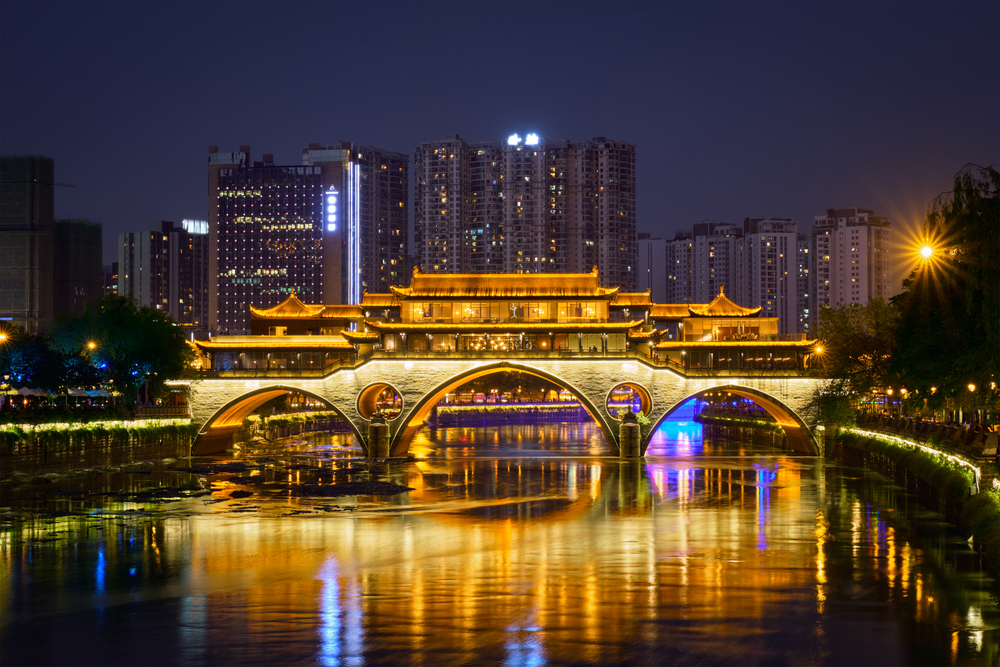 Famous landmark of Chengdu - Anshun bridge over Jin River illuminated at night, Chengdue, Sichuan , China. Anshun bridge at night, Chengdu, China